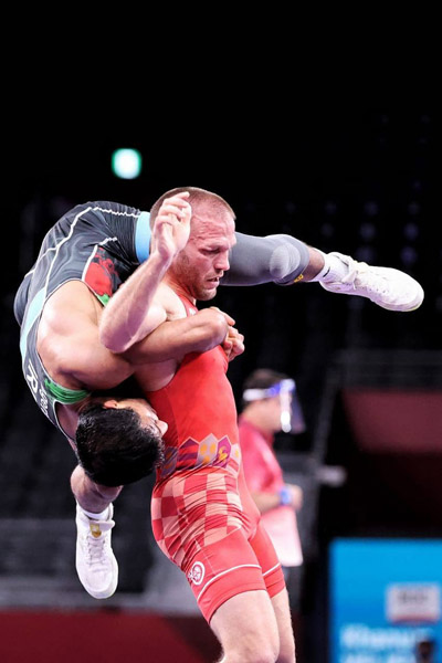 لحظه به لحظه با فن «سنجاب پرنده» در المپیک (تصاویر) لحظه به لحظه با فن «سنجاب پرنده» در المپیک (تصاویر)