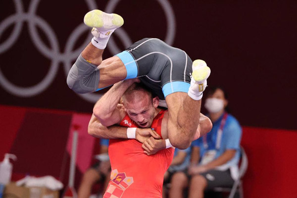 لحظه به لحظه با فن «سنجاب پرنده» در المپیک (تصاویر) لحظه به لحظه با فن «سنجاب پرنده» در المپیک (تصاویر)