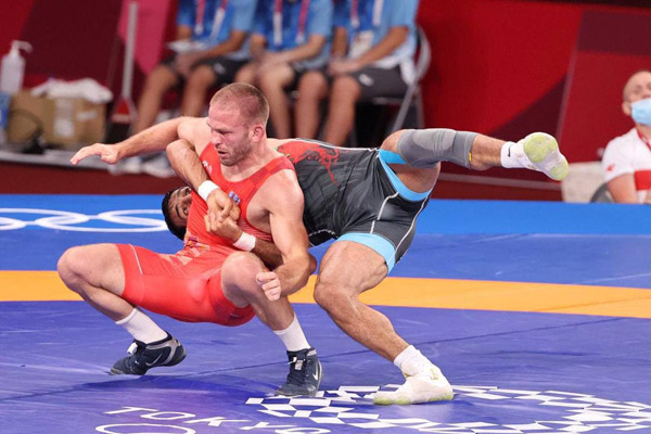 لحظه به لحظه با فن «سنجاب پرنده» در المپیک (تصاویر) لحظه به لحظه با فن «سنجاب پرنده» در المپیک (تصاویر)