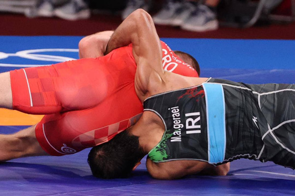 لحظه به لحظه با فن «سنجاب پرنده» در المپیک (تصاویر) لحظه به لحظه با فن «سنجاب پرنده» در المپیک (تصاویر)