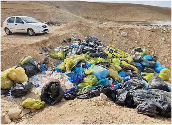 دفع زباله‌ های عفونی خطرناک بیخ گوش کرمانشاه (+عکس)