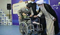 ستاد اجرای فرمان امام (ره) ۸۰دستگاه ویلچر به معلولان کرمانشاه اهدا کرد