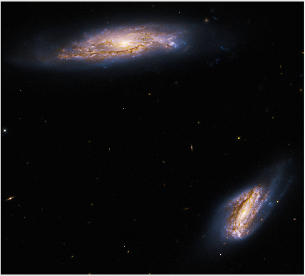 عکس | تصویر زیبای هابل از دو کهکشان عکس | تصویر زیبای هابل از دو کهکشان