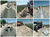 انجام عملیات احداث شبکه ٣و۴ کانال آبیاری روستای هومان شهرستان تیران و کرون
