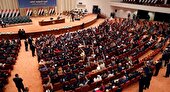 ببینید | کتک‌ کاری و پرتاب کفش در پارلمان عراق